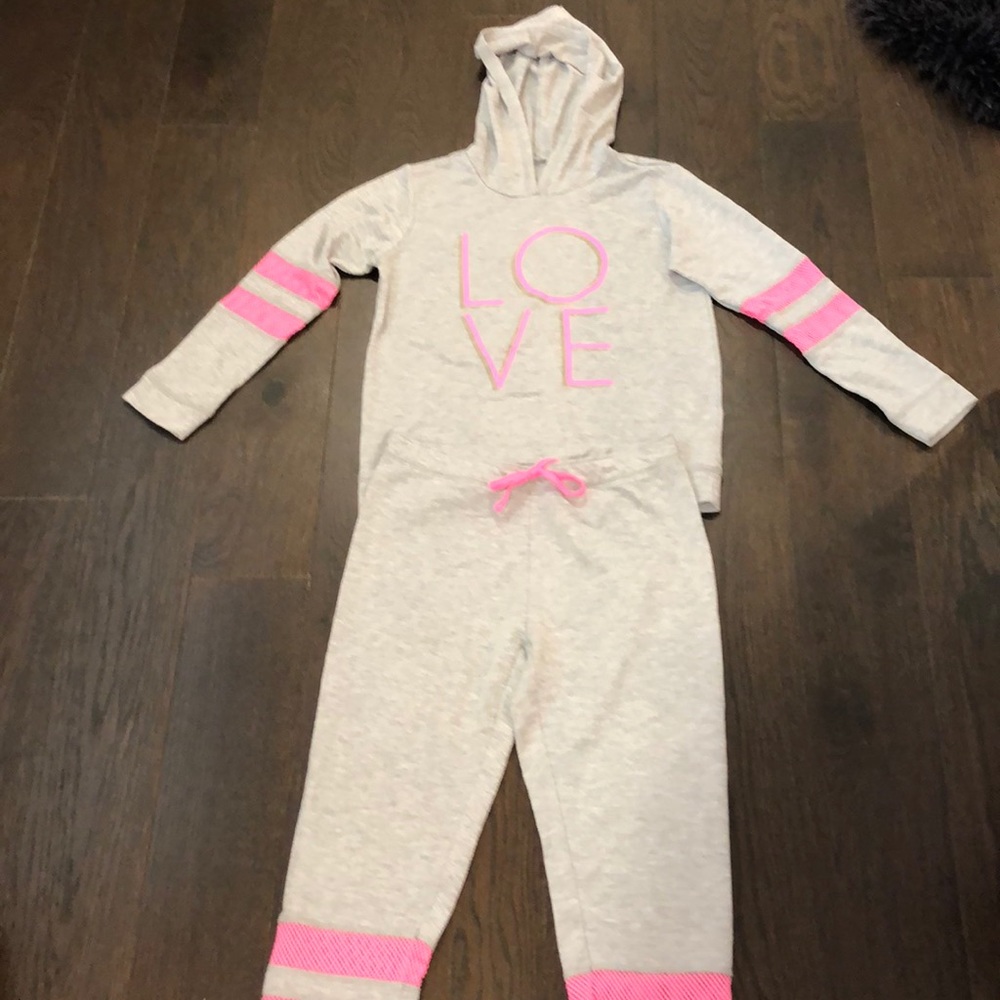 gray and pink tracksuit